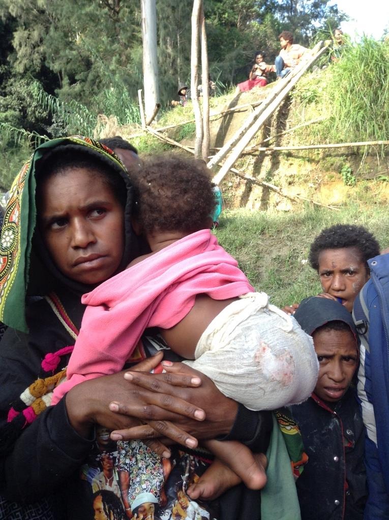 A Woman Holds Her Baby Following The Enga Landslide Taken 27 May Photo Credit Sr John Mary Wabag Diocese.JPG