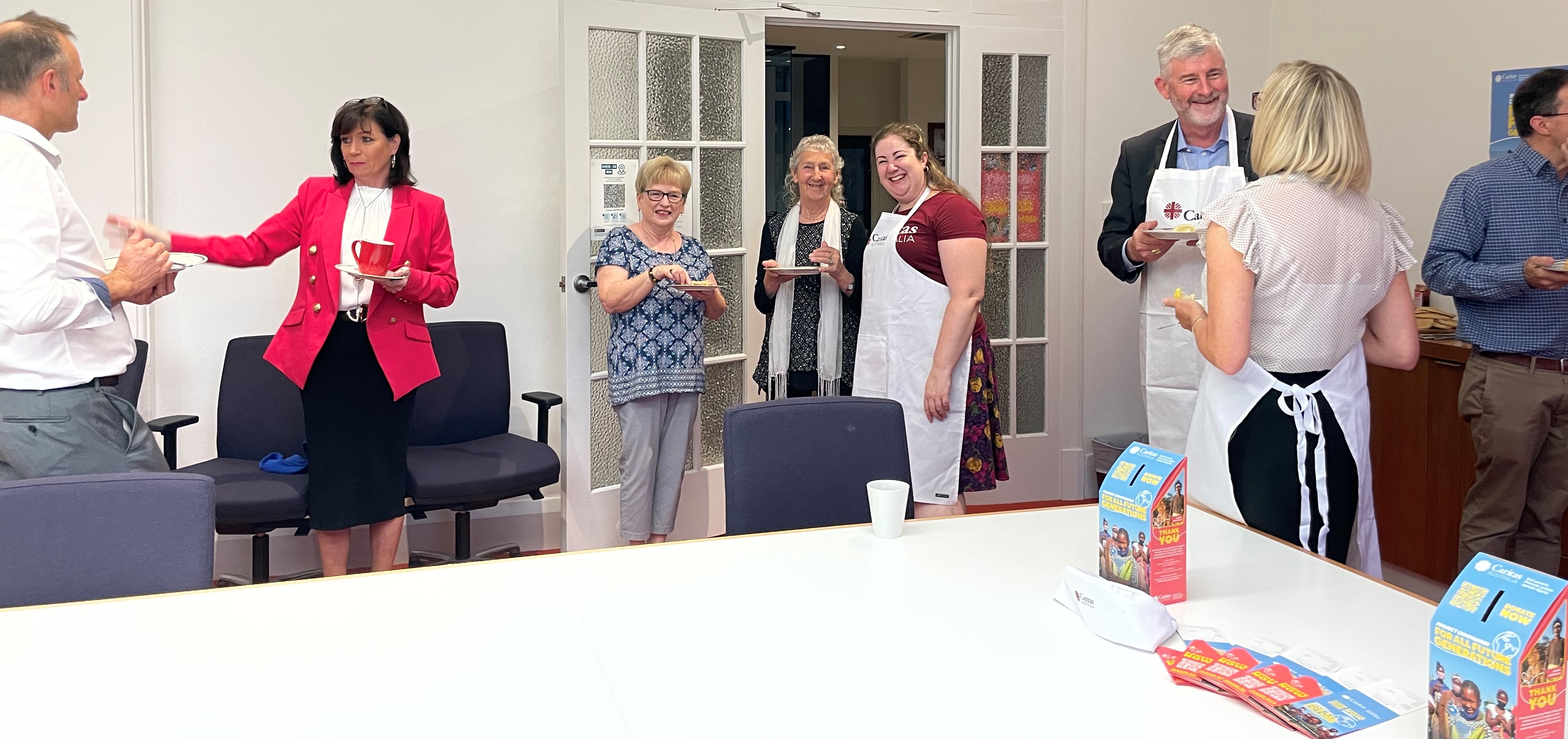 Sandhurst Diocese Chancery PC Launch Bishop & Staff Enjoy Pancakes
