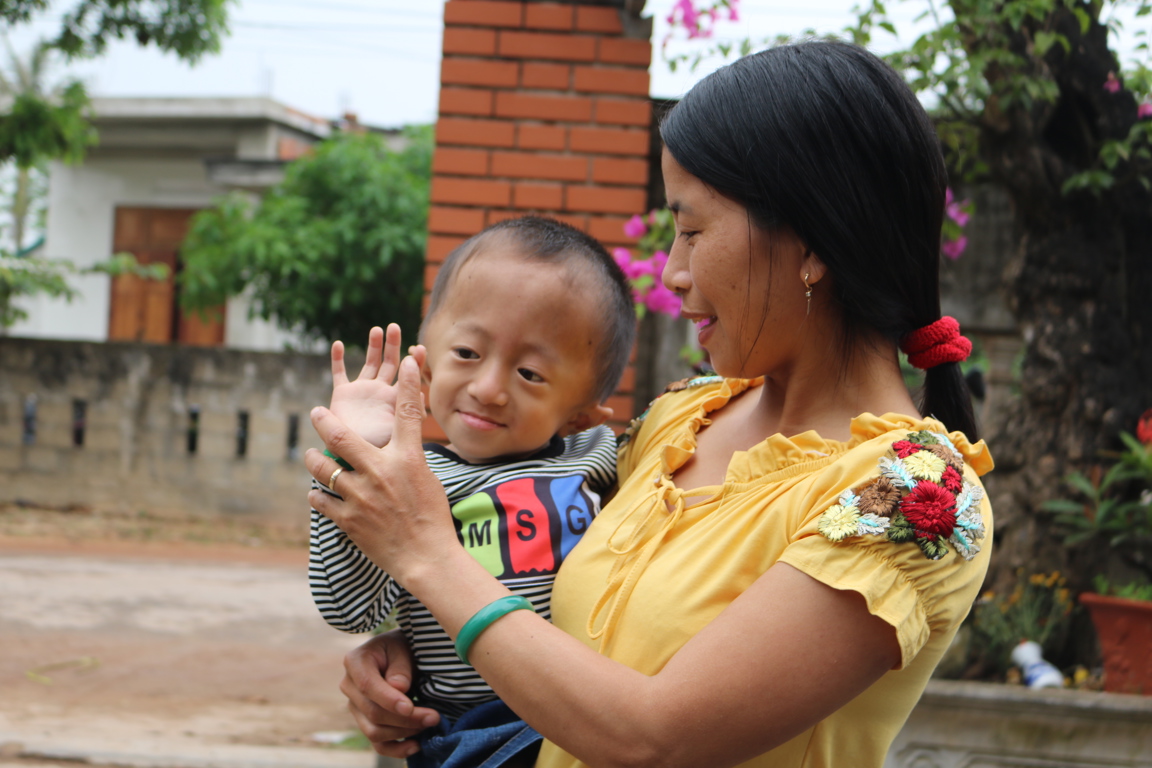 child and mother living in poorest part of Vietnam