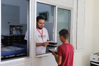 Caritas Lebanon Youth Hands Meals Out To Those In Need