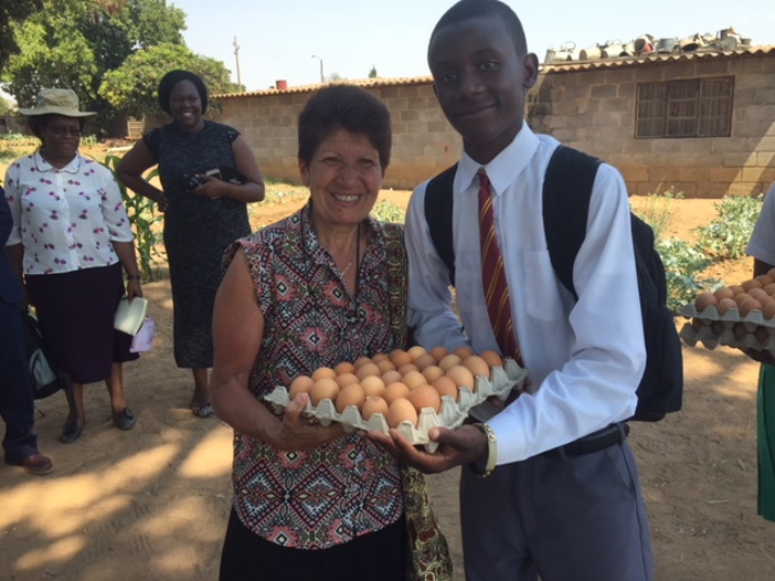 Ivy With Student Presenting Eggs