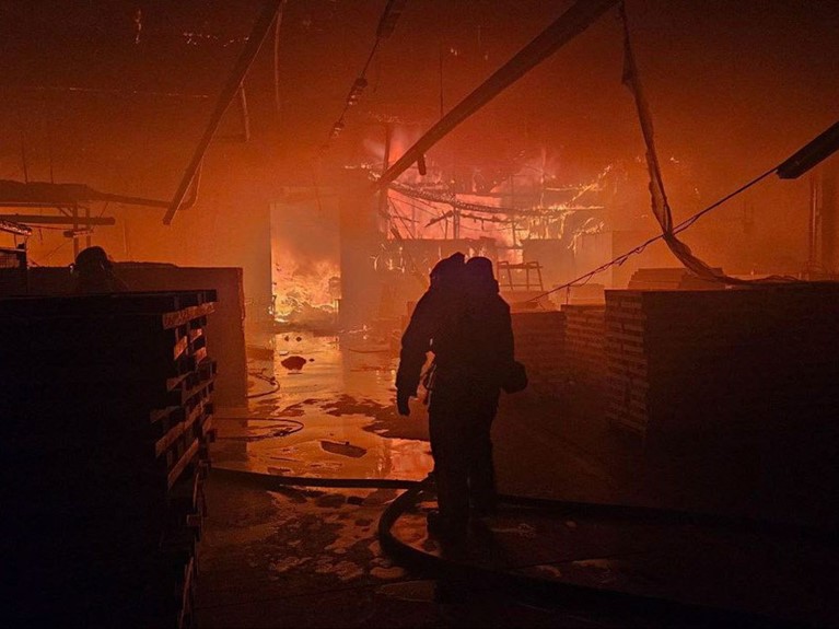 A Caritas warehouse on fire following a bombing raid in September 2023. Photo: Caritas Spes Lviv