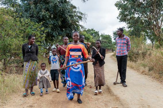 Memory And Her Family On The Farm In Malawi