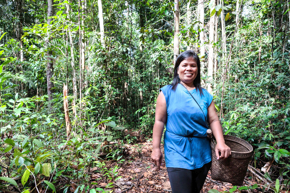 Woman who lives in poverty in Indonesian forest