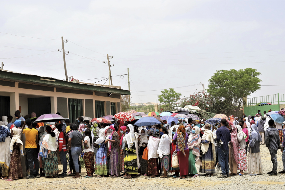 Queue For Food Distribution. Photo By Melikte Tadessse Catholic Relief Services