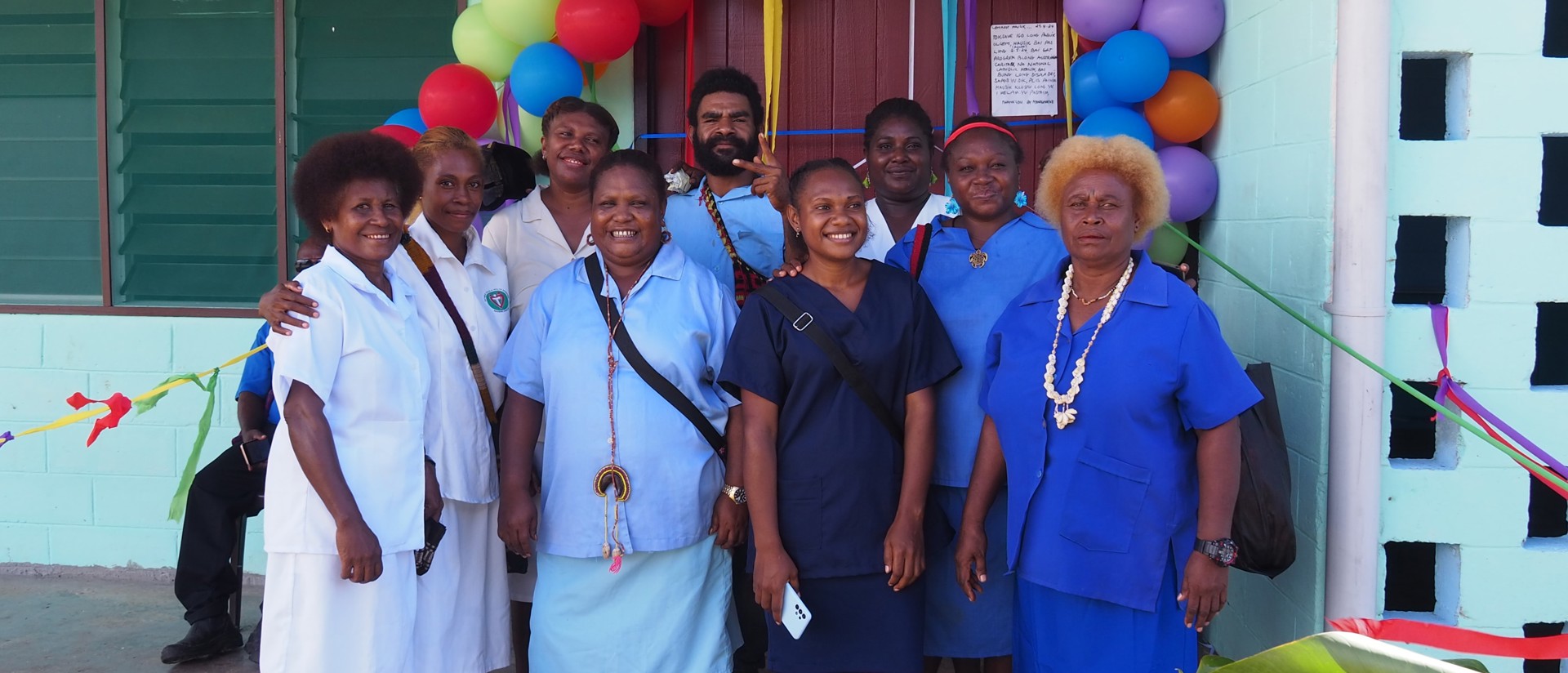 Matron Florence Copland With Staff From Lemakot Health Centre At A Reopening Ceremony Following The Completion Of A New Roof Photo Credit Caritas Australia