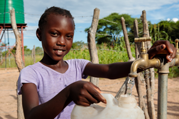 Africa Zimbabwe Drought Relief child with water