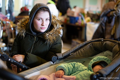 Illyena with her nine-month old baby.  Photo: Philipp Spalek/Caritas Poland