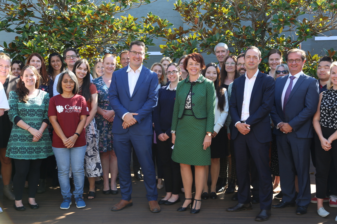 Zed Seselja With Caritas Australia Staff Closeup. Credit Caritas Australia