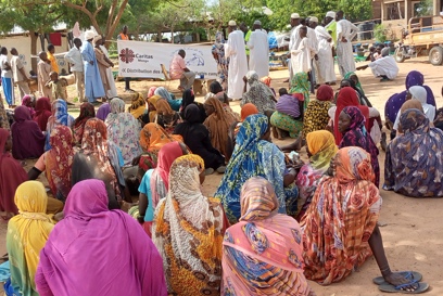 Aid Distribution At A Transit Camp For Sudanese Refugees In Chad Photo Credit Caritas Mongo