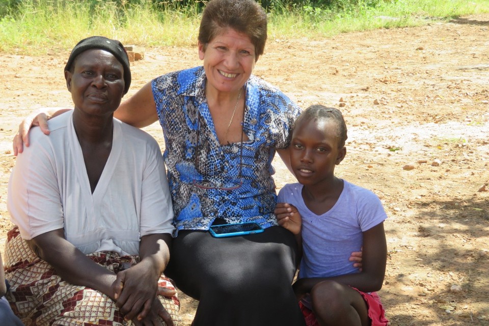 Sr Ivy Khoury Of Caritas Australia (Centre) With Thandolwayo (Right) And Her Grandmother (Left) In Zimbabwe. Photo Richard Wainwright Caritas Australia.