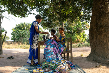 Irene Teaching Sewing