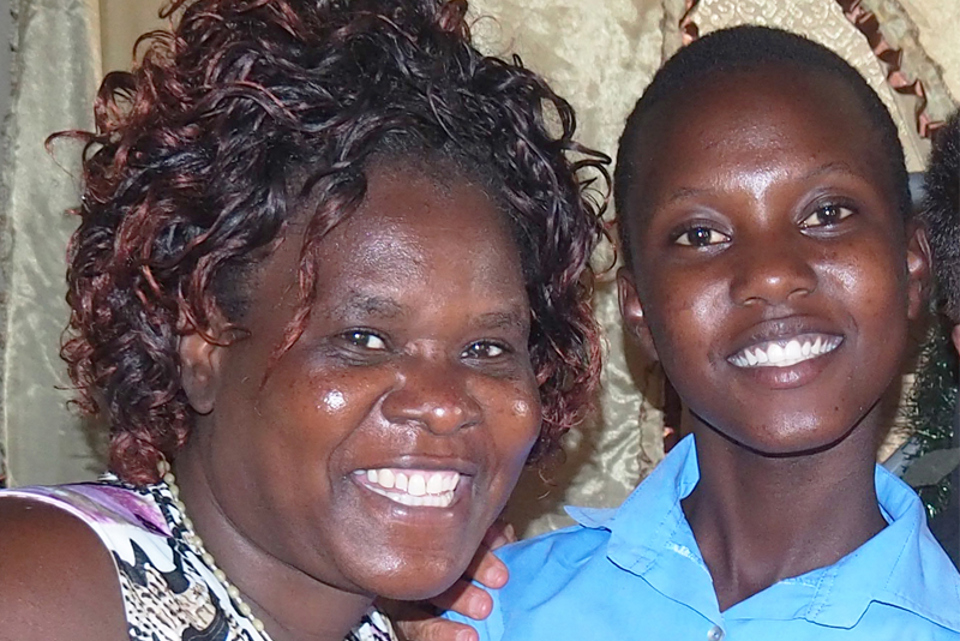 Thandolwayo with her aunt in their home in Zimbabwe (2)