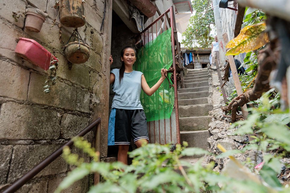 Ronita Outside Her Home