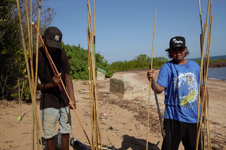 Antonio and Israel participate in spear throwing as part of a Grassroots Youth Engagement cultural activity. Photo credit: Tara Harvey for Caritas Australia.
