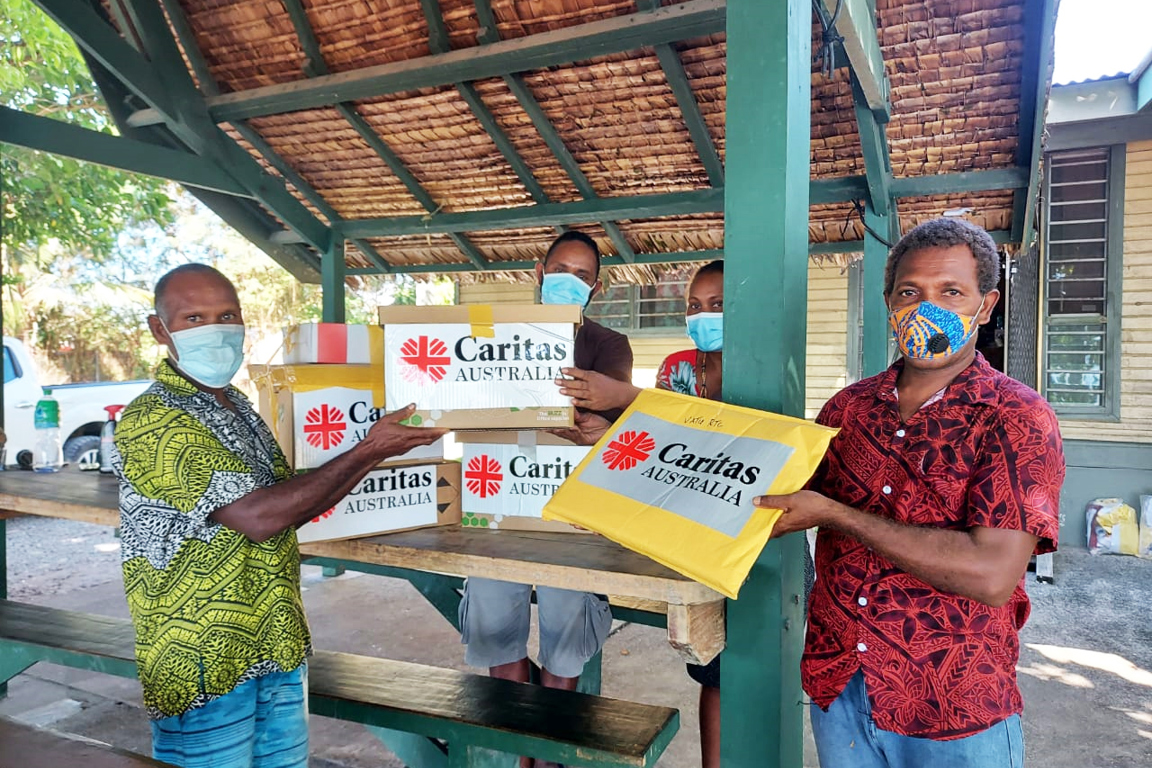 St. Augustine Remote Training Centre Staff in the Solomon Islands receiving COVID-19 school care kits. Photo credit Caritas Australia Solomon Islands