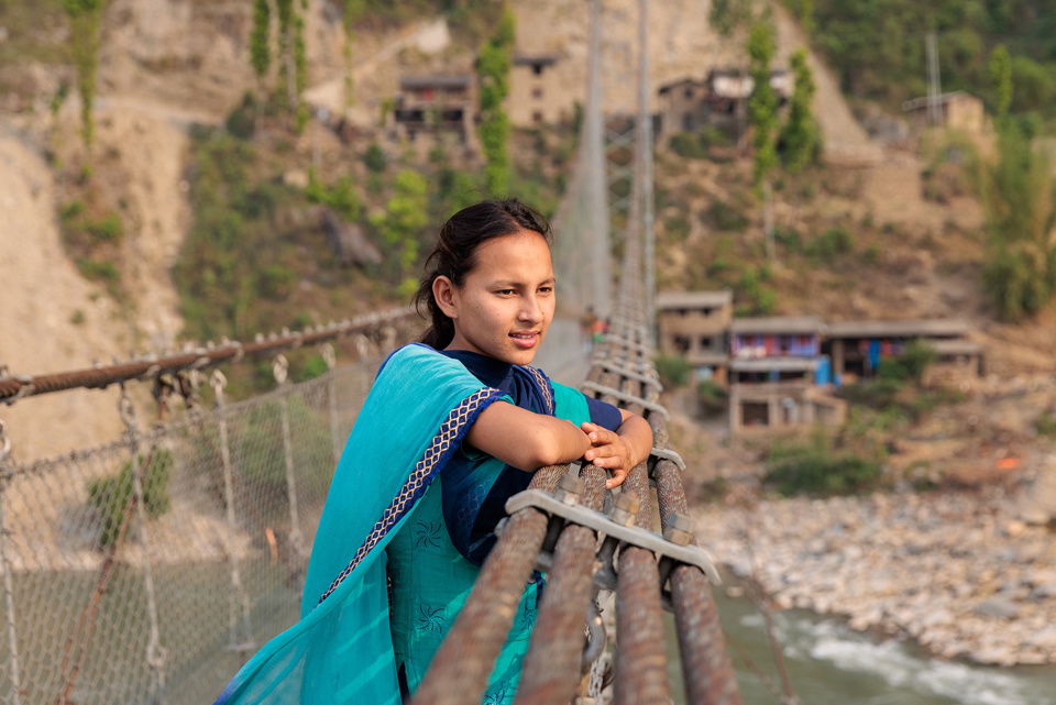 Laxmi Standing On A Bridge