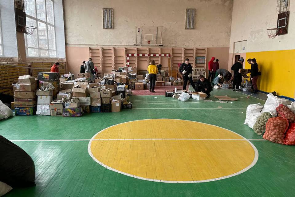 Basball Courts In Mariupol Used To Store Goods To Distribute To Trapped Civilians. Photo Caritas Ukraine