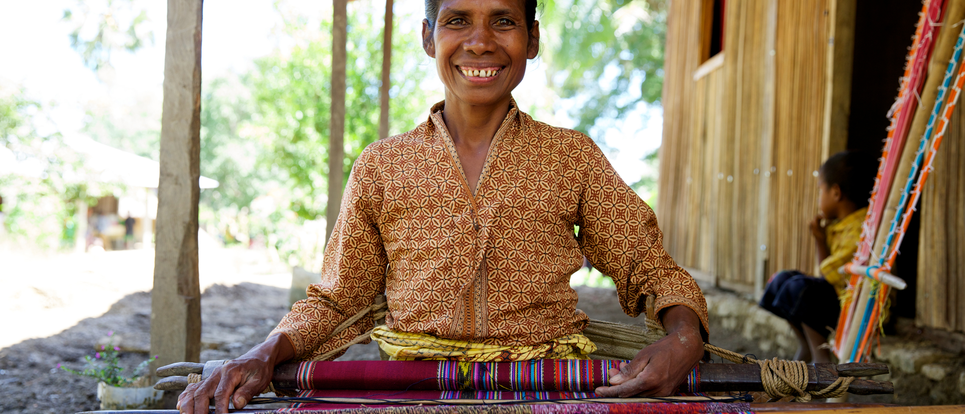 Martina A Beneficiary Of The Timor Leste Protection Program Weaving Traditional Cloth Photo Credit Caritas Australia